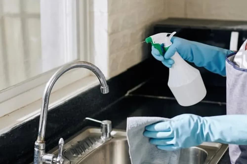 Spotless degreased kitchen counters and backsplash after a Bright Glow kitchen cleaning
