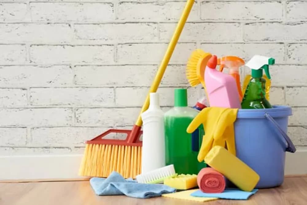 Bright Glow cleaner wiping down a tidy living room during a regular house cleaning in Converse, TX